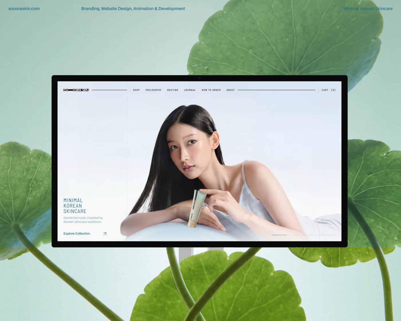 Soora Skin homepage on a laptop, framed by green centella leaves